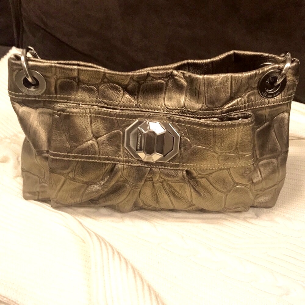 B. Makowsky leather bag.